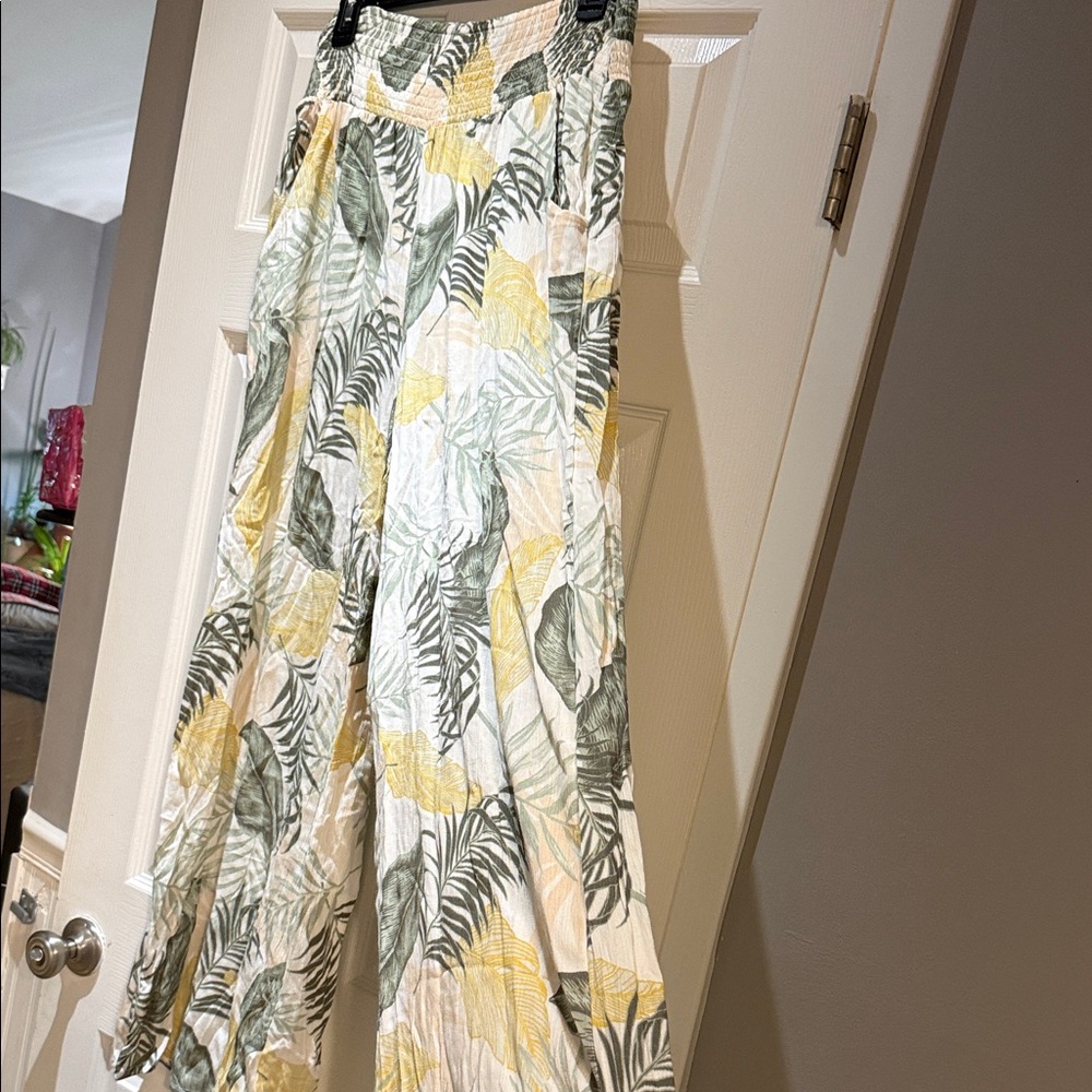 Rip Curl Cream Floral Smocked Waist Pants can be used as a beach cover up